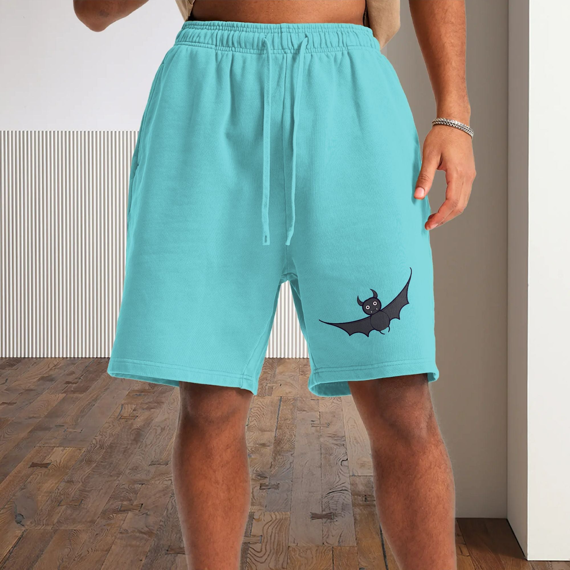 Relaxed Rhythm: Men's Poly-Blend Shorts Featuring Chic Bat Design