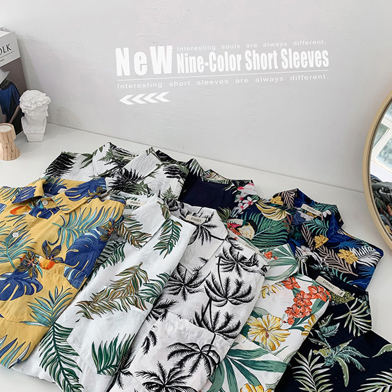 Men’s Hawaiian Aloha Shirt collection with vibrant floral prints and colorful designs, perfect for summer beachwear.