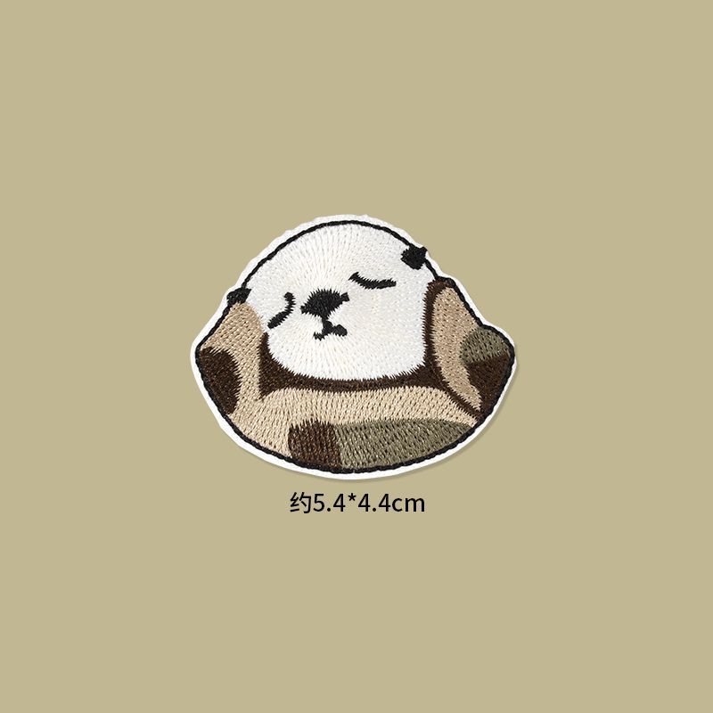 Self Adhesive Patch Stickers featuring a cute sleeping otter design, perfect for clothes and accessories.