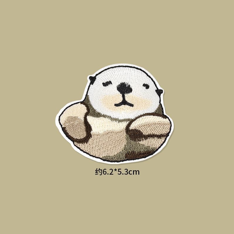 Self Adhesive Patch Stickers featuring a cute otter design in plush embroidery.